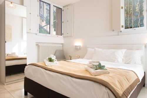 Ένα ή περισσότερα κρεβάτια σε δωμάτιο στο Grand Central Room