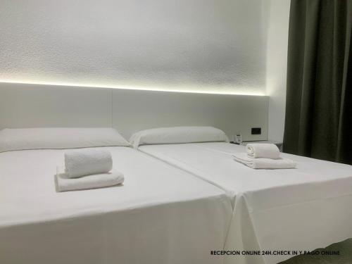Postel nebo postele na pokoji v ubytování Hotel DL Urban