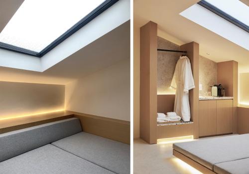 a skylight in the ceiling of a room with a bed at the house of mo in Shanghai