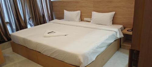 Cama o camas de una habitación en Mirage Suites