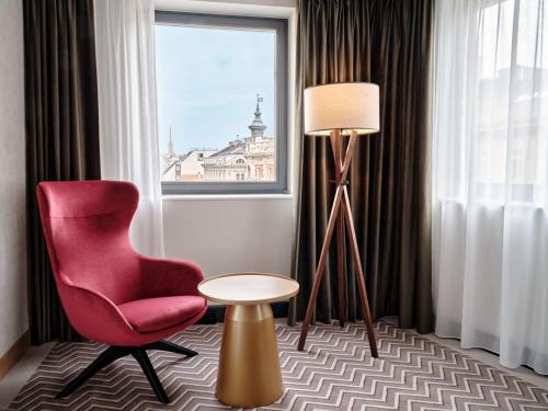 Un lugar para sentarse en Radisson Blu Das Triest Hotel, Vienna