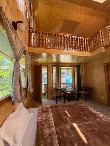 Posezení v ubytování Kudhal Home Stay