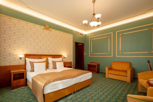Posteľ alebo postele v izbe v ubytovaní Elizabeth Hotel