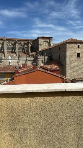 a view of a building with a red roof at Vallespin Suite II in Avila