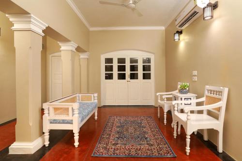 Μια τηλεόραση ή/και κέντρο ψυχαγωγίας στο Franco Tamil Villas by Western Valley Resorts