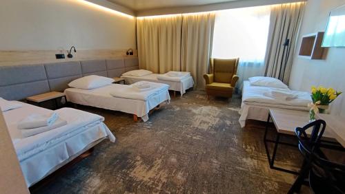 Postel nebo postele na pokoji v ubytování Hotel Relax