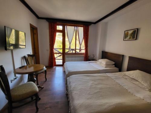 Postel nebo postele na pokoji v ubytování Mountain View ECOVILLA