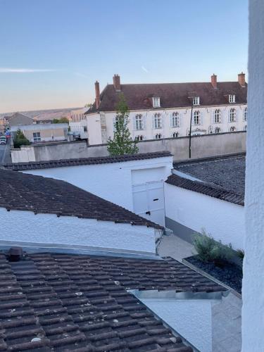 a view from the roof of a building with a garage at Gîte de la Cascade in Épernay