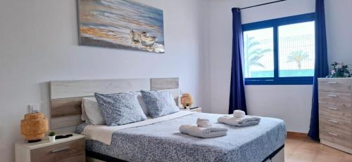 Postel nebo postele na pokoji v ubytování Casa Sol y Mar