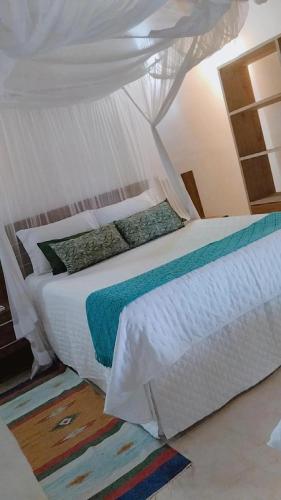 Postel nebo postele na pokoji v ubytování Casa Gabriela-Confort and Exclusivity in Trancoso