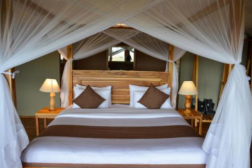 Ένα ή περισσότερα κρεβάτια σε δωμάτιο στο Manya Luxury Camp
