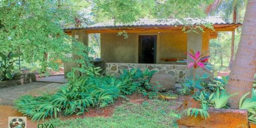 a house with a garden in front of it at Oya hideout in Anuradhapura