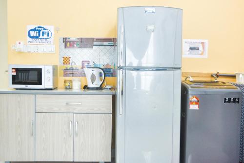 Kuchyň nebo kuchyňský kout v ubytování AZFA Suite13 at De Centrum Putrajaya-Bangi