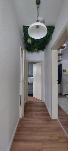 a hallway in a house with a ceiling at Ferienwohnung Sonnenhof - Remscheid - Garten - Parken - Küche - Netflix - Nähe Vaillant und Sana-Klinikum in Remscheid