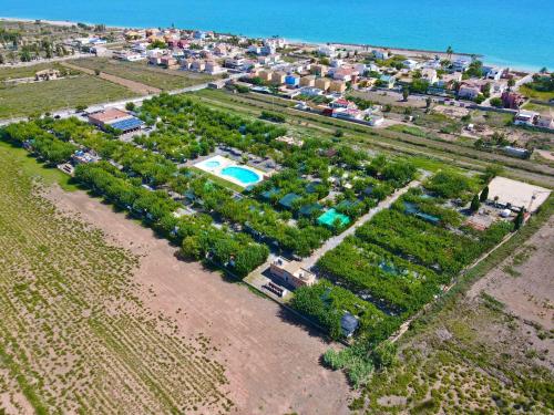 an aerial view of a yard with a pool at Camping Los Naranjos in Moncófar