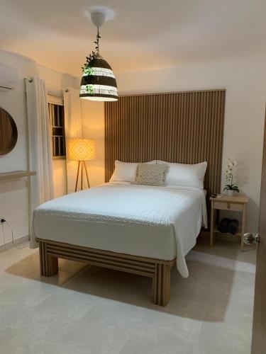 Ένα ή περισσότερα κρεβάτια σε δωμάτιο στο Iris Vacation Lovely Place