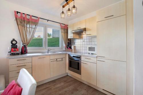 Dapur atau dapur kecil di Ferienwohnung Bäumchen