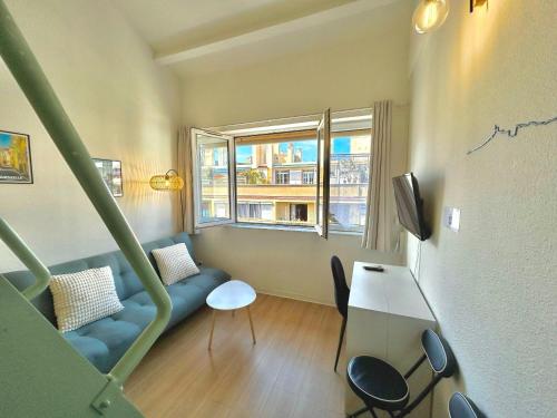 TV a/nebo společenská místnost v ubytování Chez Martin - Studio tout confort proche Hôpitaux Universitaires Timone Conception - quartier St Pierre