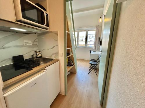 Kuchyň nebo kuchyňský kout v ubytování Chez Martin - Studio tout confort proche Hôpitaux Universitaires Timone Conception - quartier St Pierre