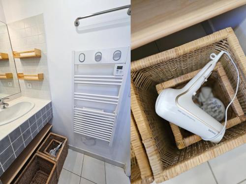 une salle de bain avec un lavabo et des toilettes dans l'établissement Mazet vue mer - parking - wifi - clim - piscine, à Sainte-Maxime
