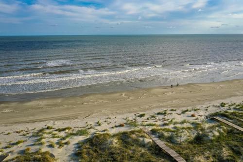 an aerial view of a beach with the ocean at 46 Surfsong Road by Akers Ellis Rentals in Kiawah Island
