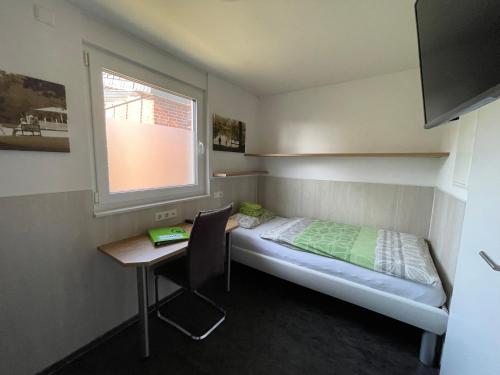 Postel nebo postele na pokoji v ubytování Birkenhain 2a - Lastering Ferienhäuser & Apartments