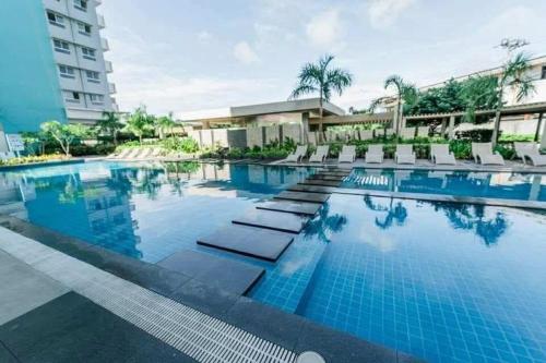a swimming pool at the resort at Bacolod Condo CASA LEA in Bacolod