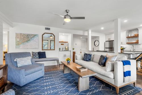 a living room with a couch and a table at 4821 Turtle Cove Villa by Akers Ellis Rentals in Kiawah Island