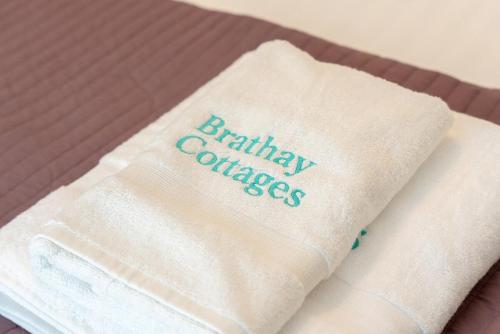 a white napkin with the words birthday cakes on it at Todd Crag - Amazing Views in Ambleside