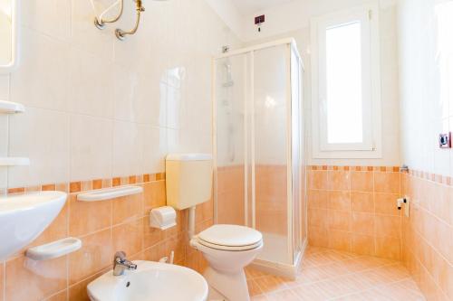 Koupelna v ubytování Villaggio Le Acacie