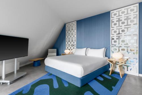 En eller flere senge i et værelse på Room Mate Aitana, Amsterdam