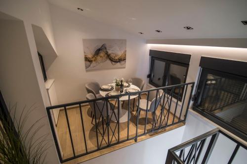 a dining room with a table and chairs at Vila Luca in Mostar