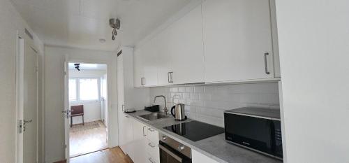 Кухня или мини-кухня в Stockholm Guest House
