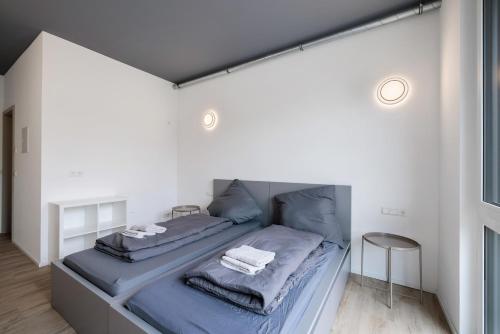 Postel nebo postele na pokoji v ubytování Boardinghouse27