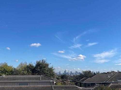 a view of the city from the roofs of houses at BrightPrivateRoom#Camberwell#City&shops#Tram72,75 in Melbourne