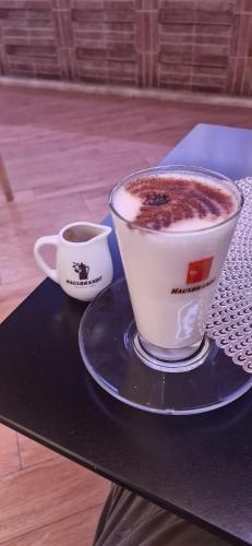 two cups of coffee sitting on a table at Il Gallo di Gallura in Tempio Pausania