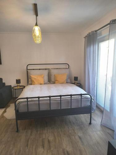 apartmán 1kk Zlámankaにあるベッド