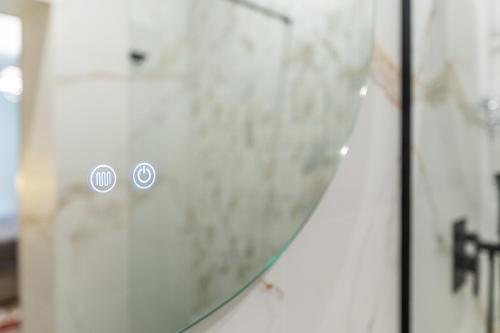 a glass door with two stickers on it at Pensiunea Casa Weiss in Rimetea