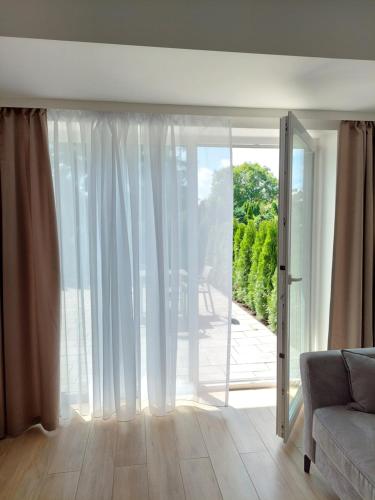 Apartament z tarasem A04 w Welle