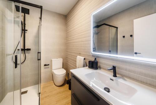 Ένα μπάνιο στο Luxury Apartamento Jambo