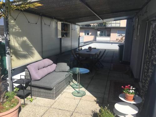 Unique little house on a roof top with a huge terrace close to exhibition square