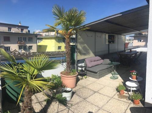 Unique little house on a roof top with a huge terrace close to exhibition square