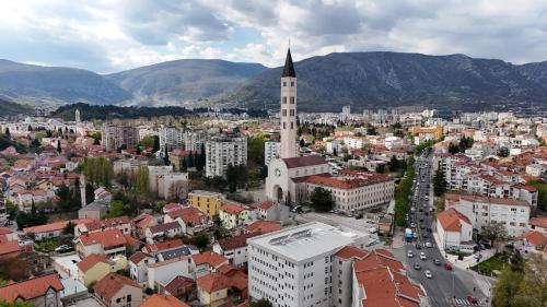 an aerial view of a city with a church at Vila Luca in Mostar
