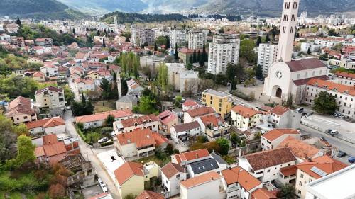 an aerial view of a city with buildings at Vila Luca in Mostar
