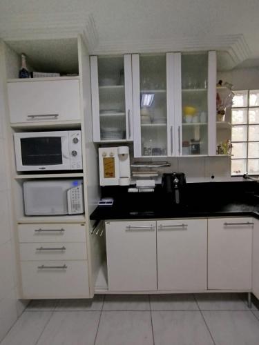 Dapur atau dapur kecil di Casa em Vitória - Próximo a Praia