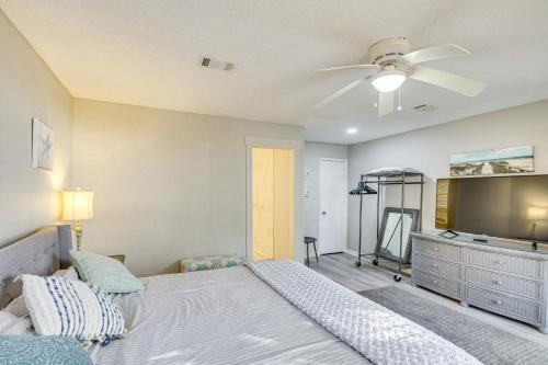 a bedroom with a bed and a ceiling fan at Bayfront Haven Group Getaway in Milton! in Milton