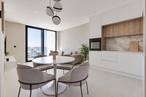 Kuchyň nebo kuchyňský kout v ubytování Apartina Boutique Suites