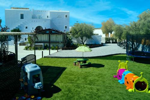 a backyard with a playground with at Dream on Plaka in Plaka