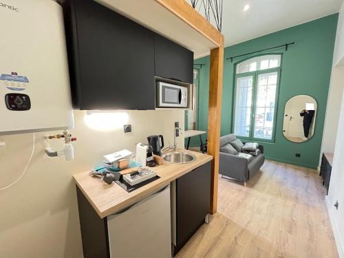 Photo de la galerie de l'établissement Studio tout confort dans une résidence de charme, à Saint-Étienne