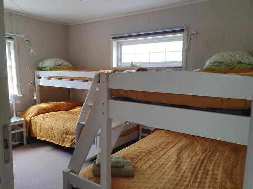 Postel nebo postele na pokoji v ubytování Ekeliden B&B